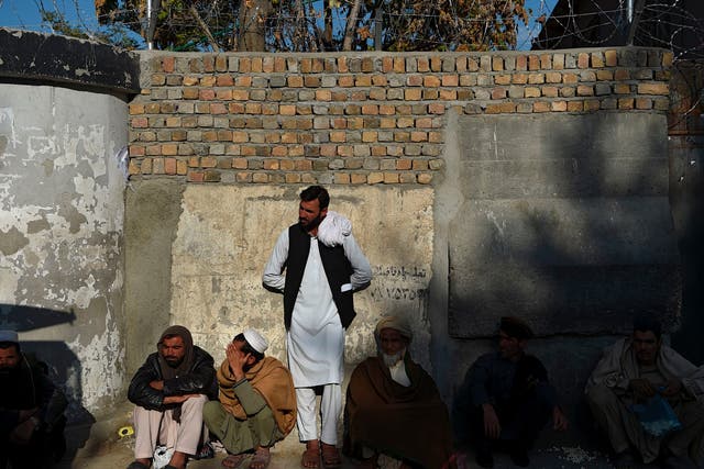 Afghans waiting for their visas outside Pakistan’s embassy, in Kabul on 4 November, 2019