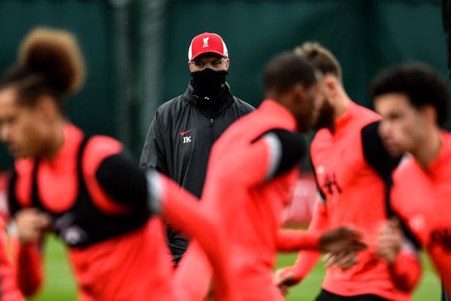 Jurgen Klopp watches over Liverpool training