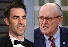 Giuliani claims he was tucking in his shirt during Borat clip