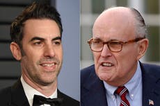 Giuliani claims he was tucking in his shirt during Borat clip