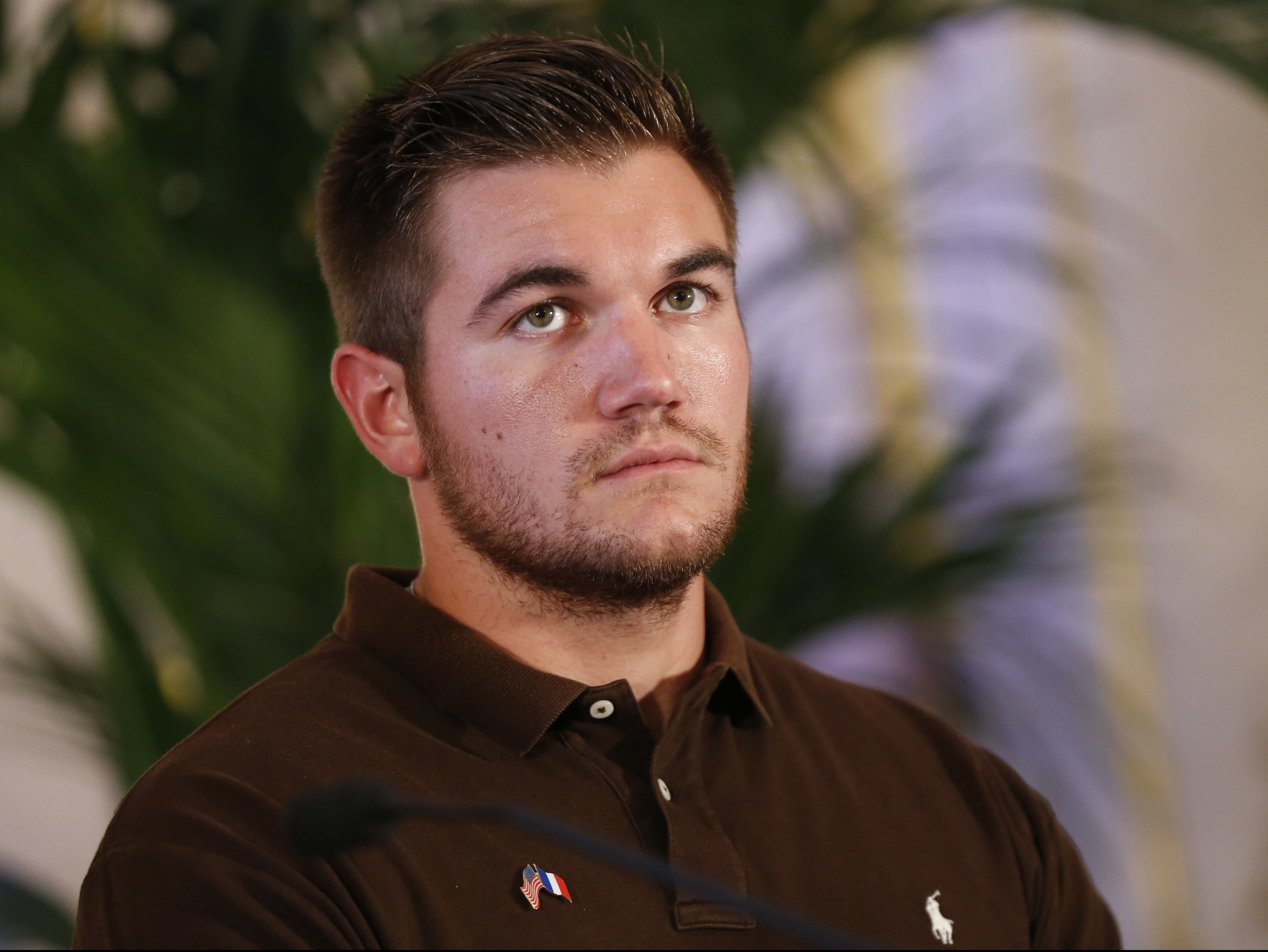 Alek Skarlatos looks on during a press conference at the US embassy in Paris on August 23, 2015