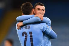 Bruised Man City pass stern Porto test in Champions League opener