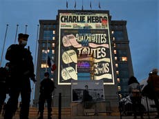 Charlie Hebdo cartoons projected onto government buildings in France
