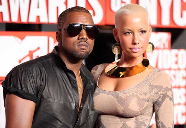 <p>Kanye West with ex-girlfriend Amber Rose in 2009 </p>