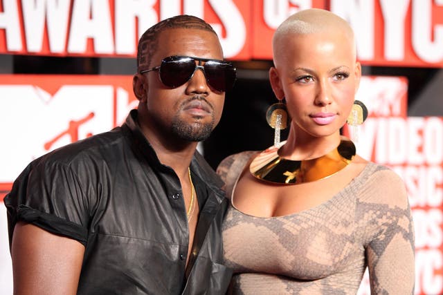 <p>Kanye West with ex-girlfriend Amber Rose in 2009 </p>