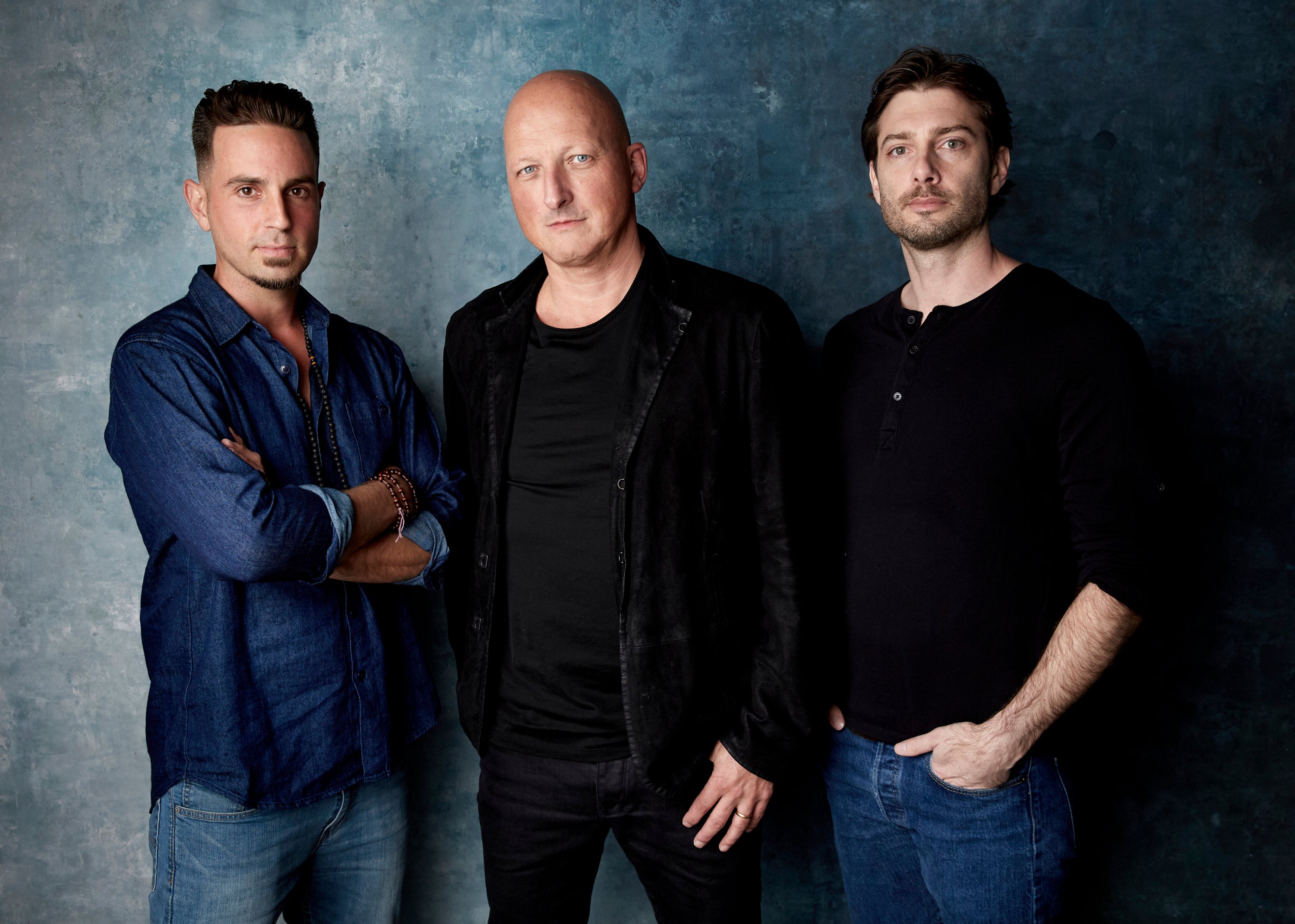 James Safechuck, from right, director Dan Reed and Wade Robson pose for a portrait to promote the film ‘Leaving Neverland’