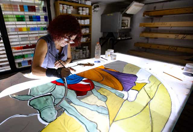 Maya Husseini works on a piece for a cathedral under construction in Jordan, in her basement workshop on the outskirts of Beirut, on 18 September 2020