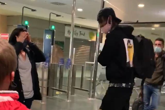 Young man pays for woman’s bag