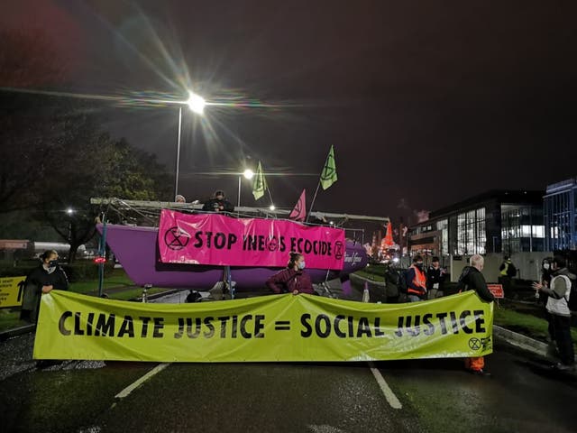 Extinction Rebellion activists protest with face masks and in groups of six or less at Ineos’s Grangemouth facility - home to Scotland’s only crude oil refinery