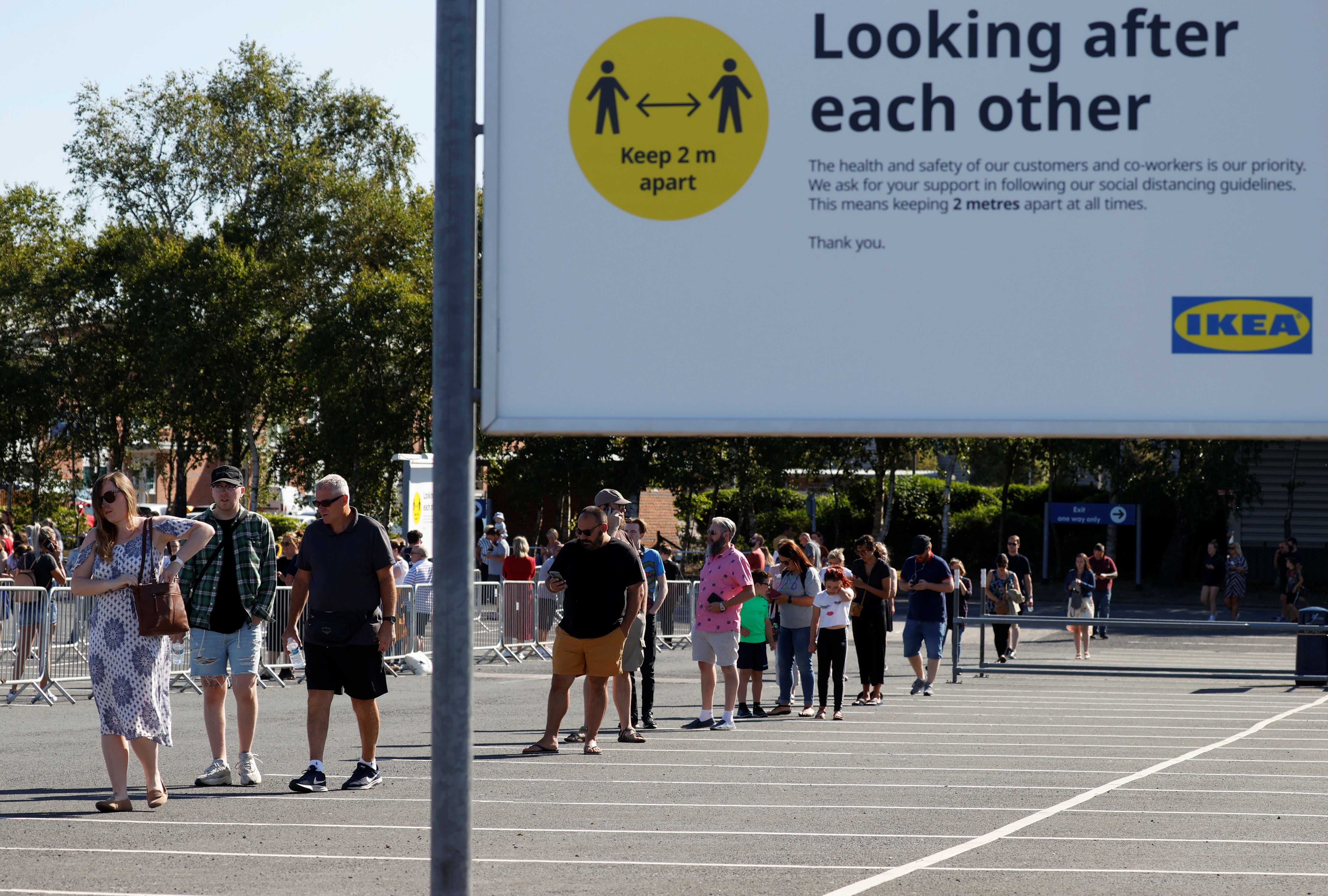 Shoppers in Warrington observe social distancing