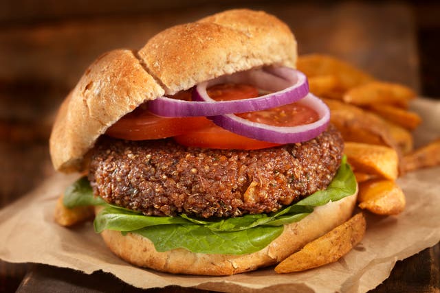 A vegetarian burger made from quinoa, chick peas, rolled outs, onions and garlic