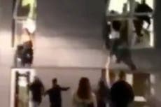 Students filmed jumping out of windows when security break up party