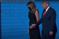 Melania Trump pulls her hand away from her husband following debate