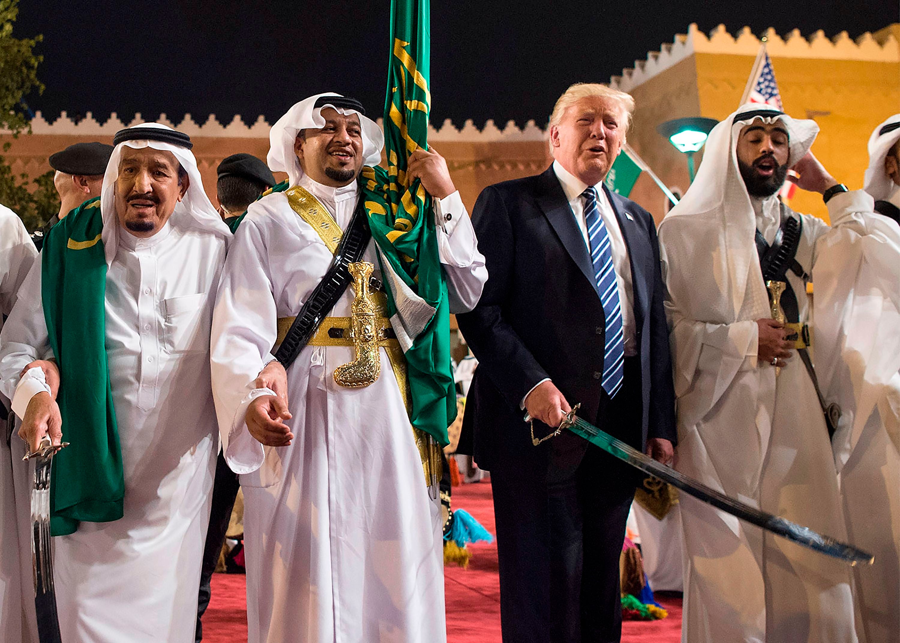 Trump at the Saudi Royal Palace in May 2017, a trip which launched a dramatic relationship revamp that freed the hands of the Gulf monarchies. (Photo by BANDAR AL-JALOUD/Saudi Royal Palace/AFP via Getty Images)