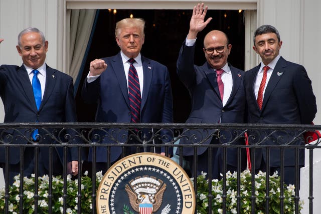 <p>Israeli Prime Minister Benjamin Netanyahu, US President Donald Trump, Bahrain Foreign Minister Abdullatif al-Zayani, and UAE Foreign Minister Abdullah bin Zayed Al-Nahyan wave from the Truman Balcony at the White House after they participated in the signing of the Abraham Accords. (Photo by SAUL LOEB/AFP via Getty Images)</p>