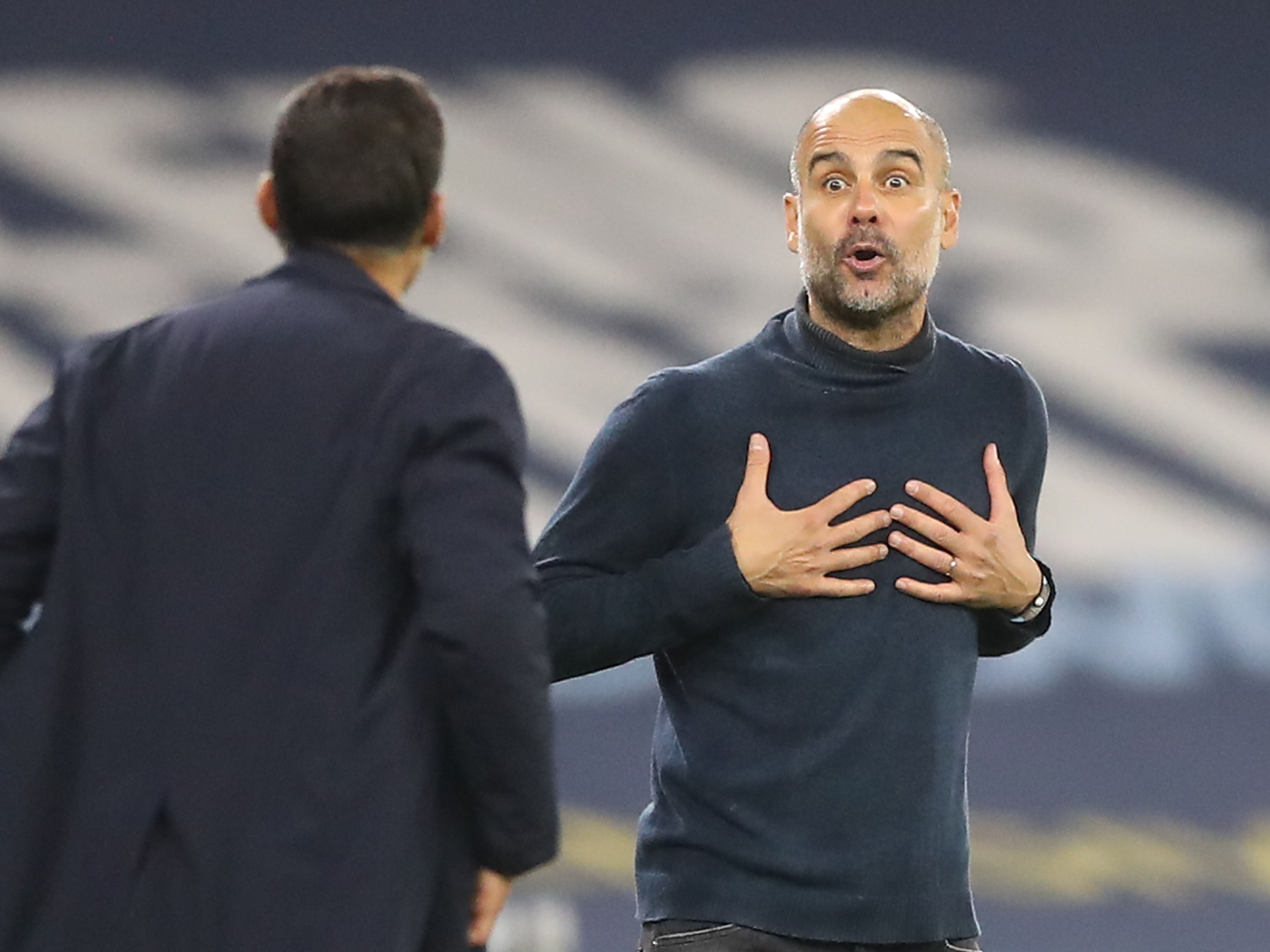 Manchester City manager Pep Guardiola and Sergio Conceicao