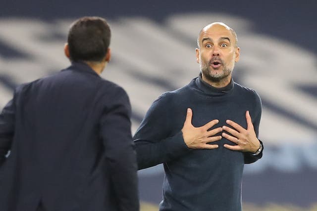 Manchester City manager Pep Guardiola and Sergio Conceicao