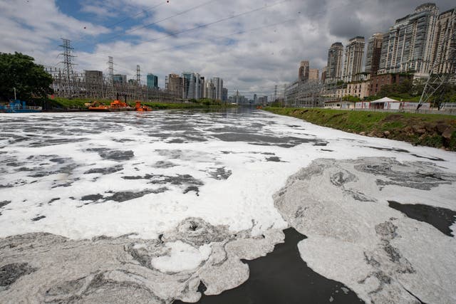 APTOPIX Brazil Polluted River