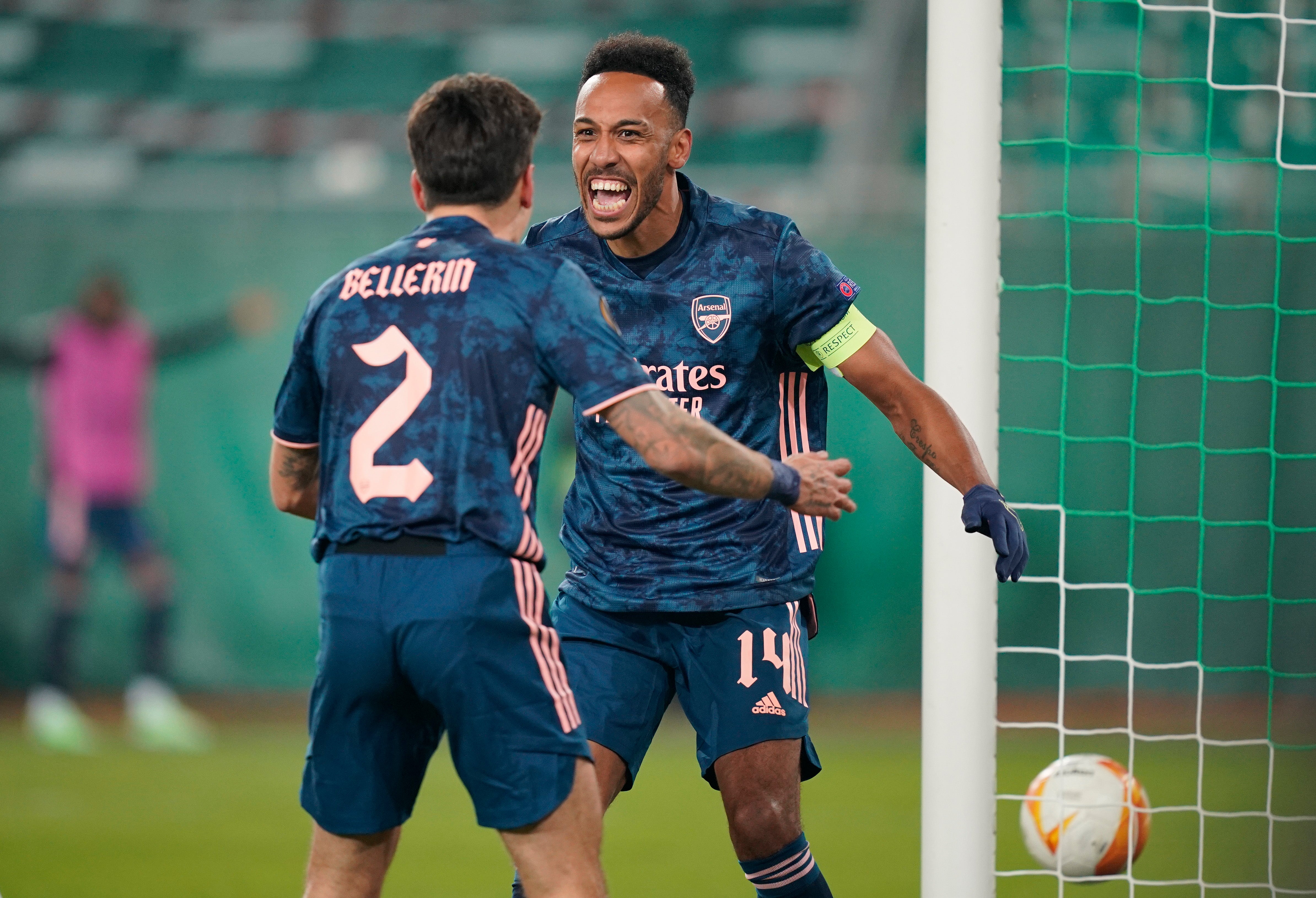 Pierre-Emerick Aubameyang of Arsenal celebrates with team mate Hector Bellerin