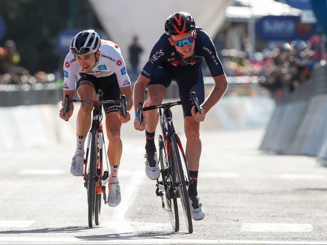 Tao Geoghegan Hart, right, sprints clear of Jai Hindley to win stage 20