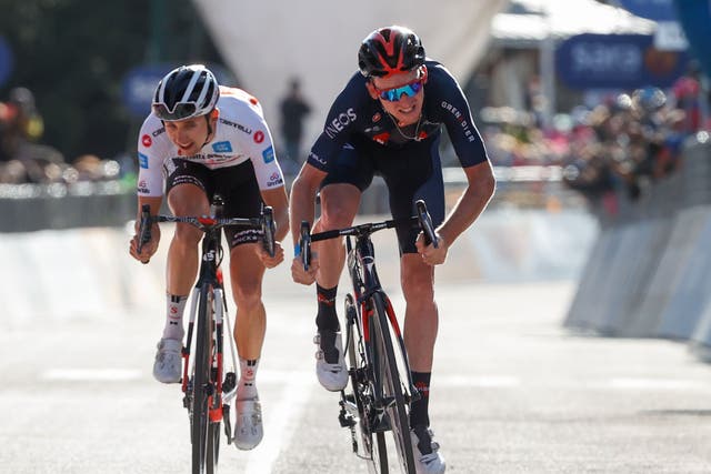 Tao Geoghegan Hart, right, sprints clear of Jai Hindley to win stage 20
