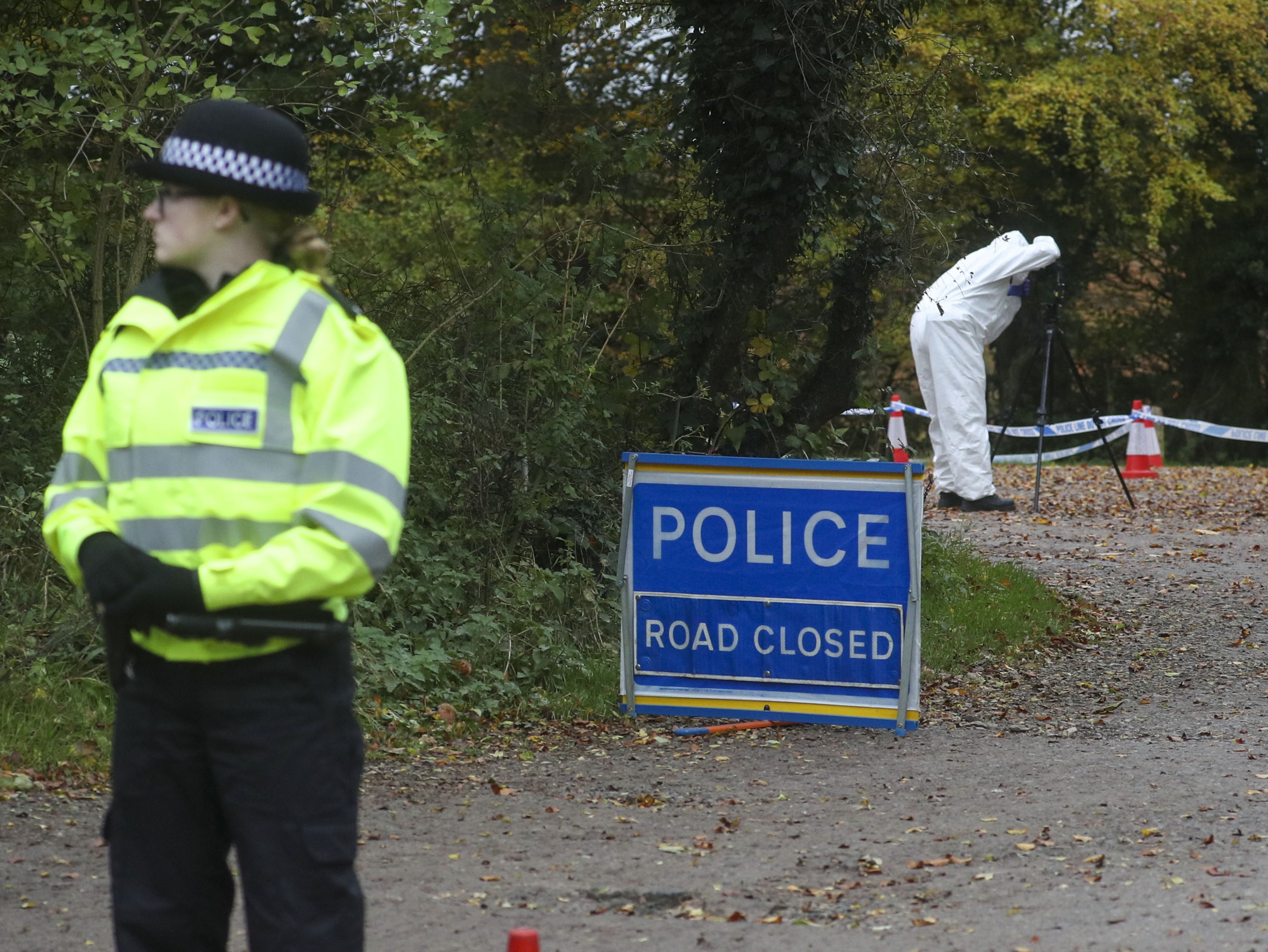 Forensic investigators at Watlington Hill in Oxfordshire as detectives investigate murder of woman aged in her 60s