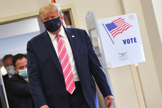 President Donald Trump leaves after casting his ballot at the Palm Beach County Public Library, during early voting for the 3 November election