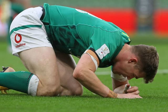 Garry Ringrose reacts before going off injured for Ireland