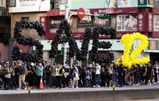 Hundreds march in Taiwan to support 12 arrested Hong Kongers
