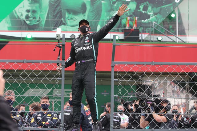 Lewis Hamilton celebrates winning the Portuguese Grand Prix
