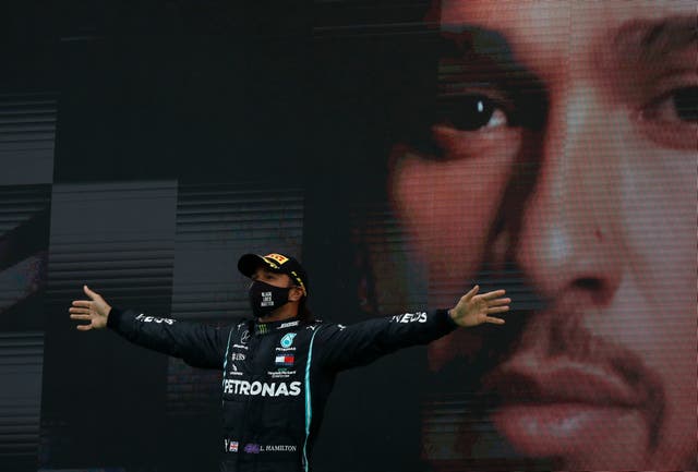 Lewis Hamilton celebrates winning the Portuguese Grand Prix