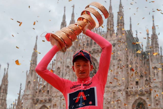 Tao Geoghegan Hart celebrates winning the Giro d'Italia