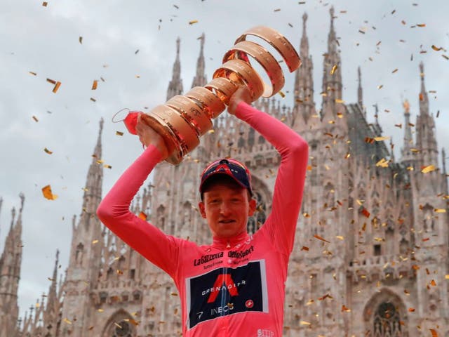 Tao Geoghegan Hart celebrates winning the Giro d'Italia