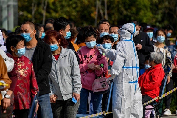China has largely been successful in bringing infection rates down with mass testing and strict city-wide lockdowns
