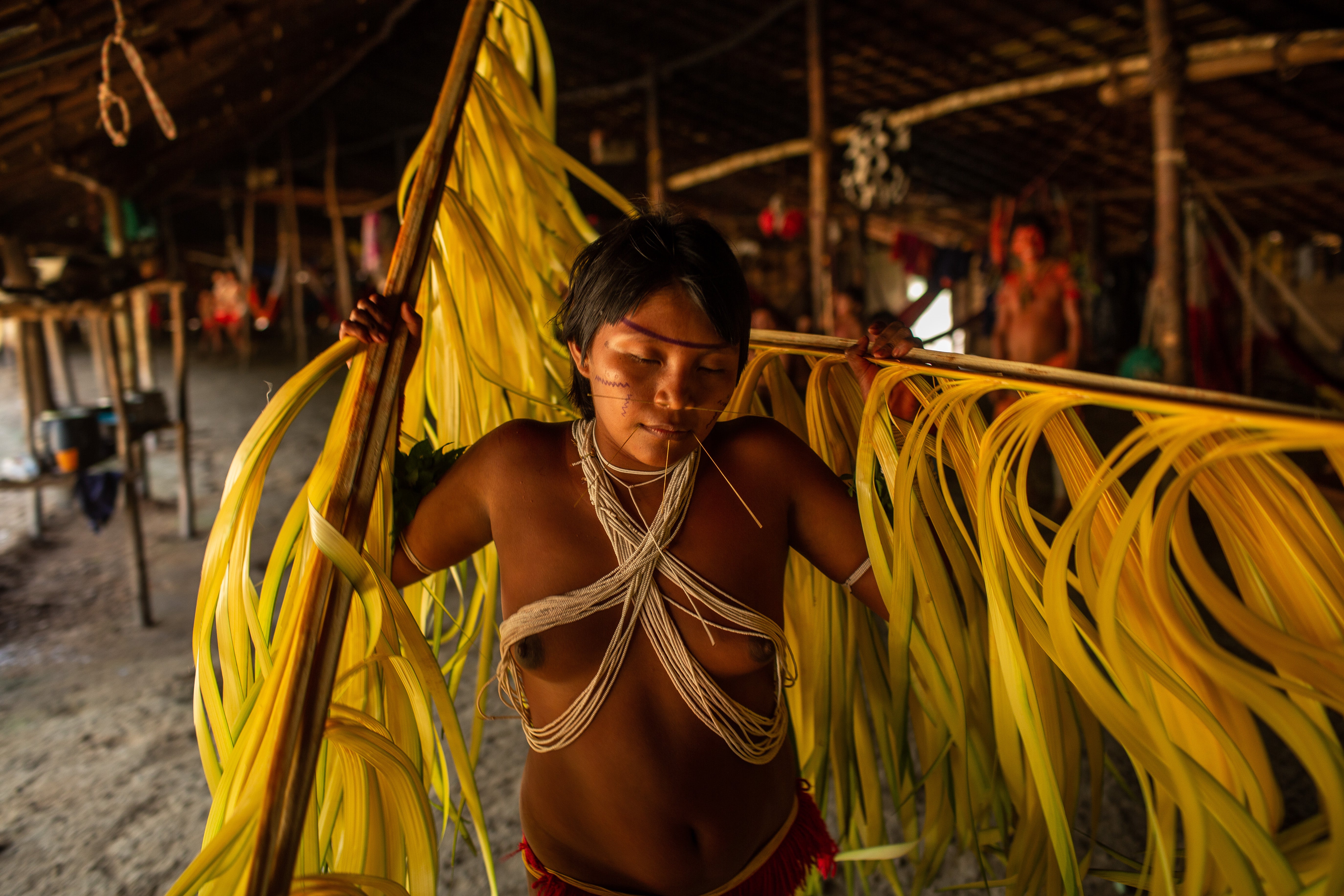 A Yanomami woman dances