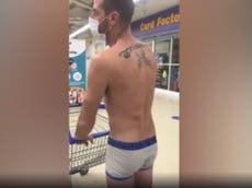 Man shops in underpants to protest ‘non-essential’ clothes in Wales