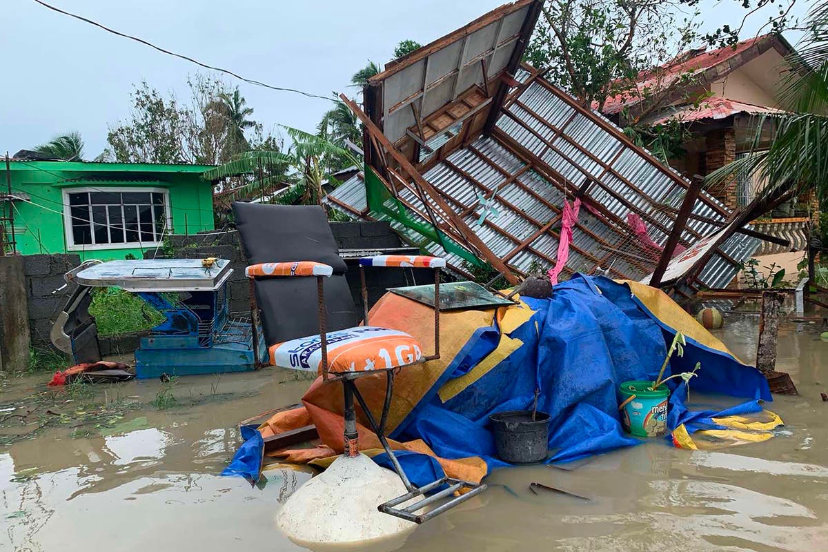 Typhoon Molave: Vietnam ready to evacuate 1.3m as a dozen missing in Philippines