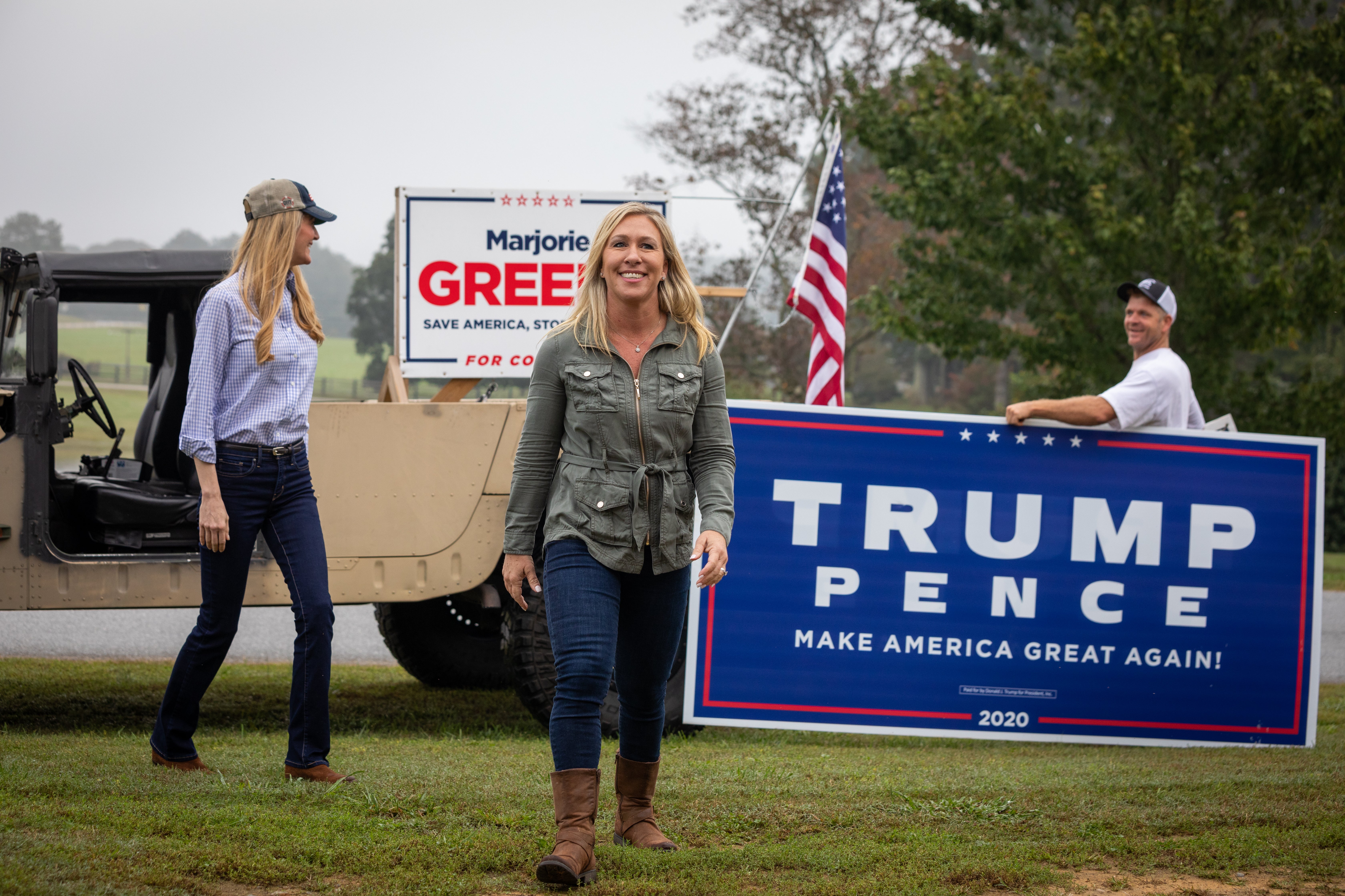 Republican Senator Kelly Loeffler and Republican House candidate Marjorie Taylor Greene, who has expressed support for QAnon, campaign in Georgia on 15 October.