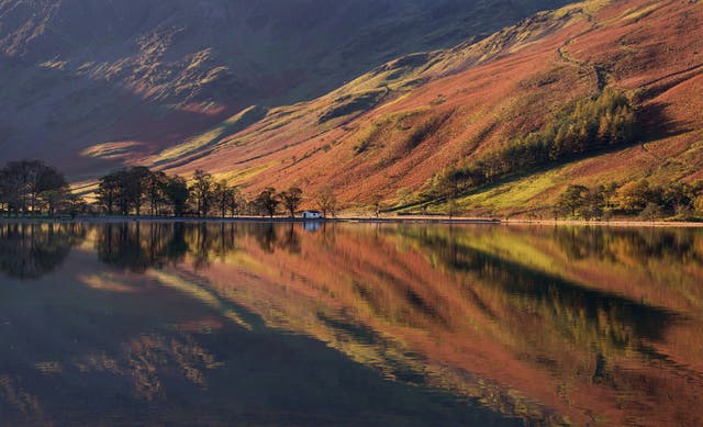 Autumnal reflections in Lake Buttermere in the Lake District