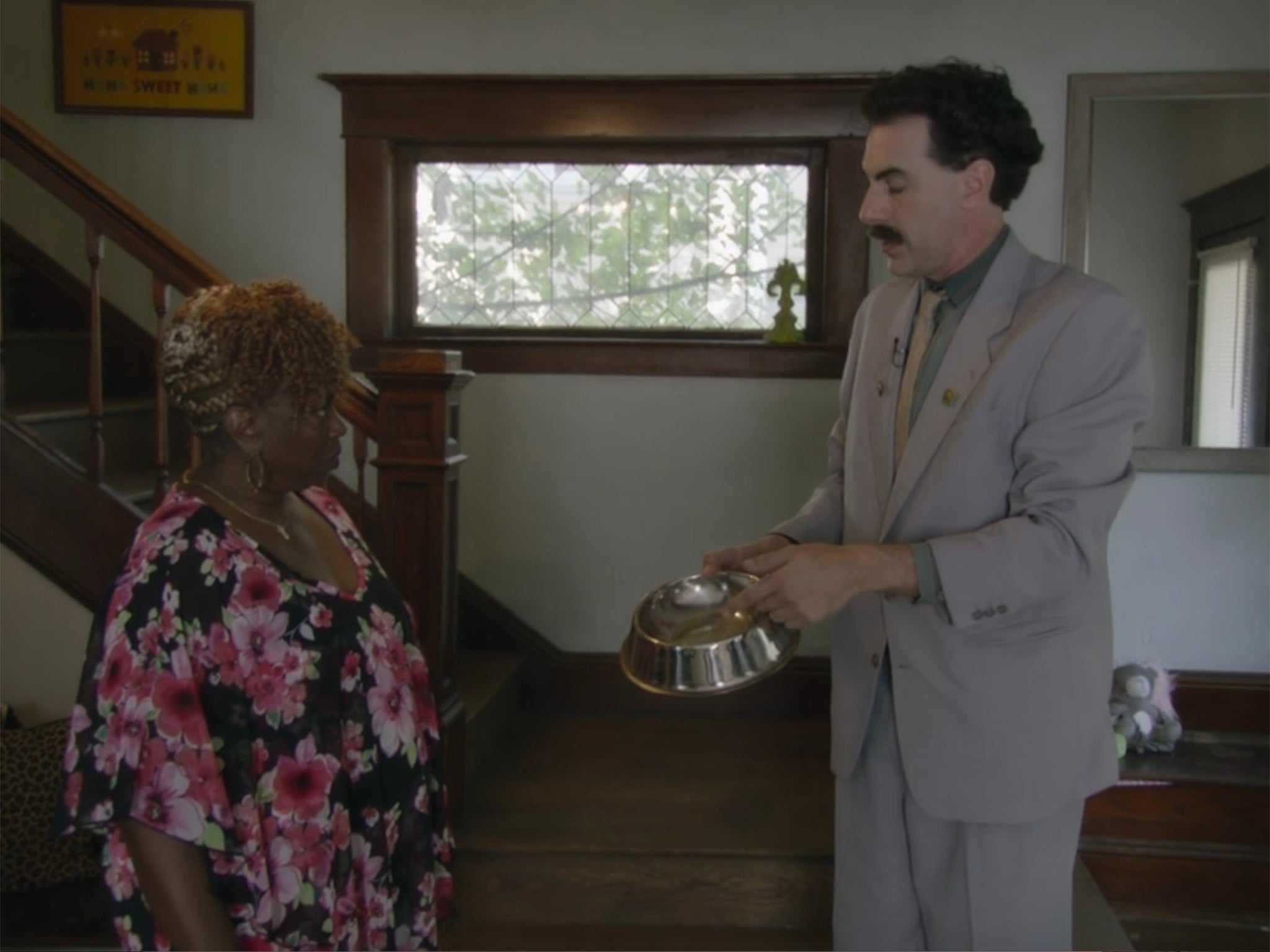 Jones and Borat (Sacha Baron Cohen) in ‘Borat 2'
