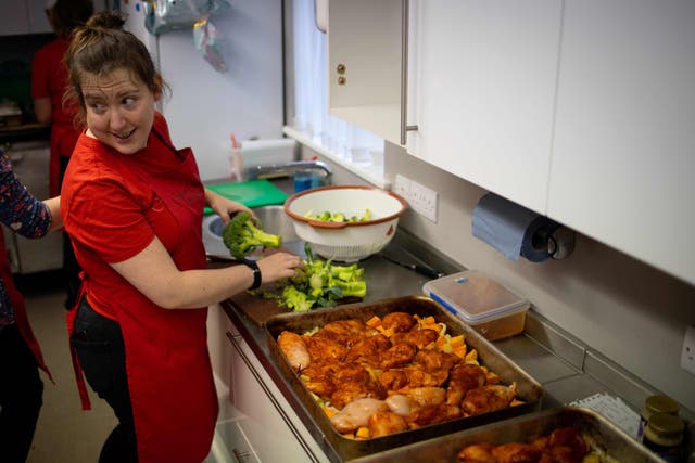 Meals being prepared for vulnerable families at a food bank in north London