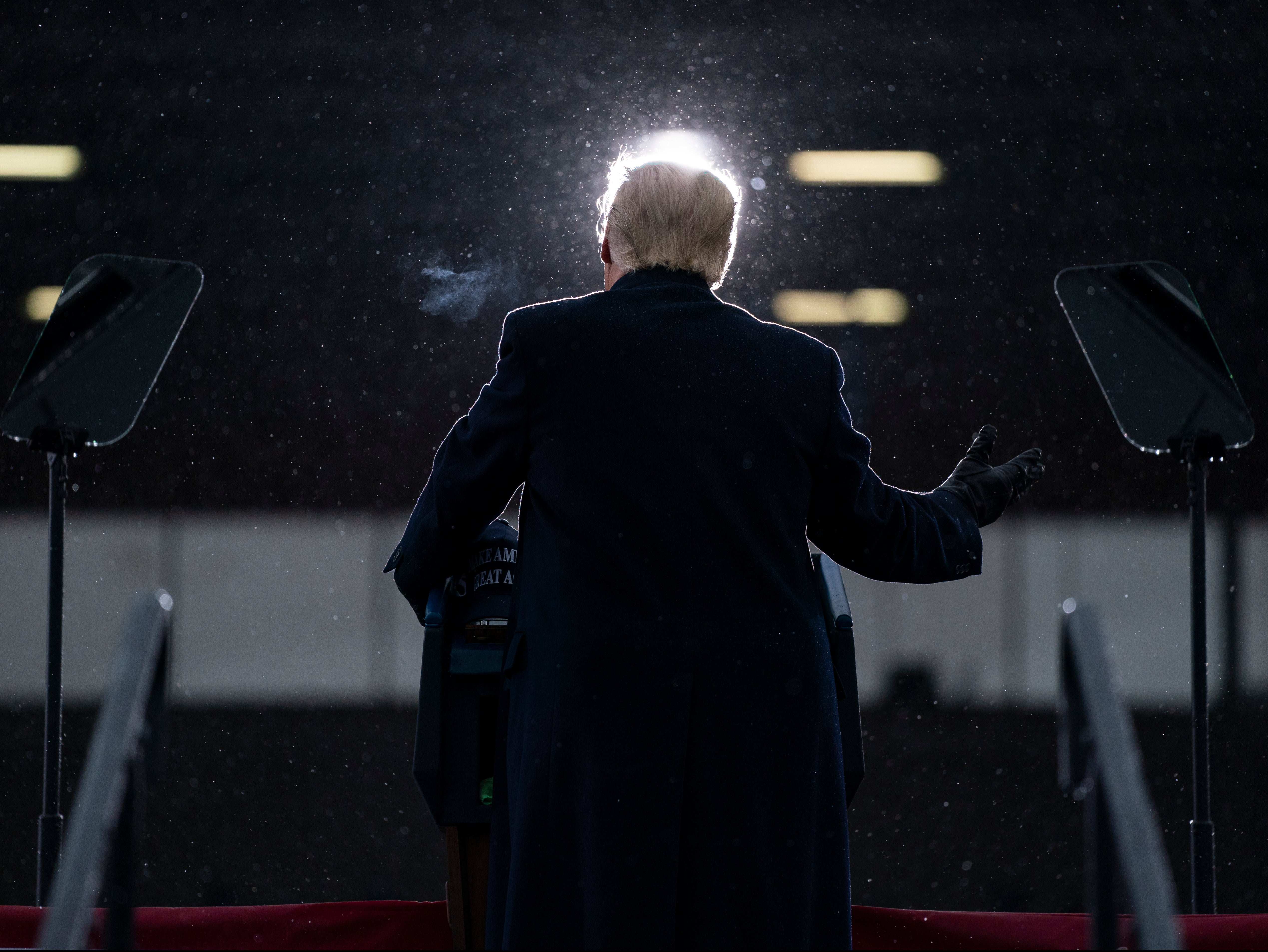 President Donald Trump speaks during a campaign rally at Capital Region International Airport