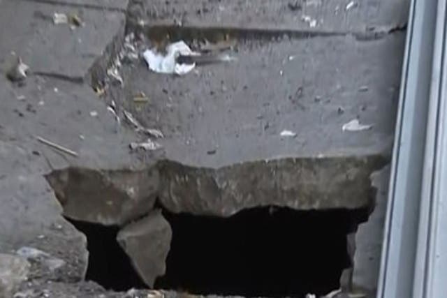 The hole in the Bronx pavement that Leonard Shoulders fell down on Saturday 24 October 2020