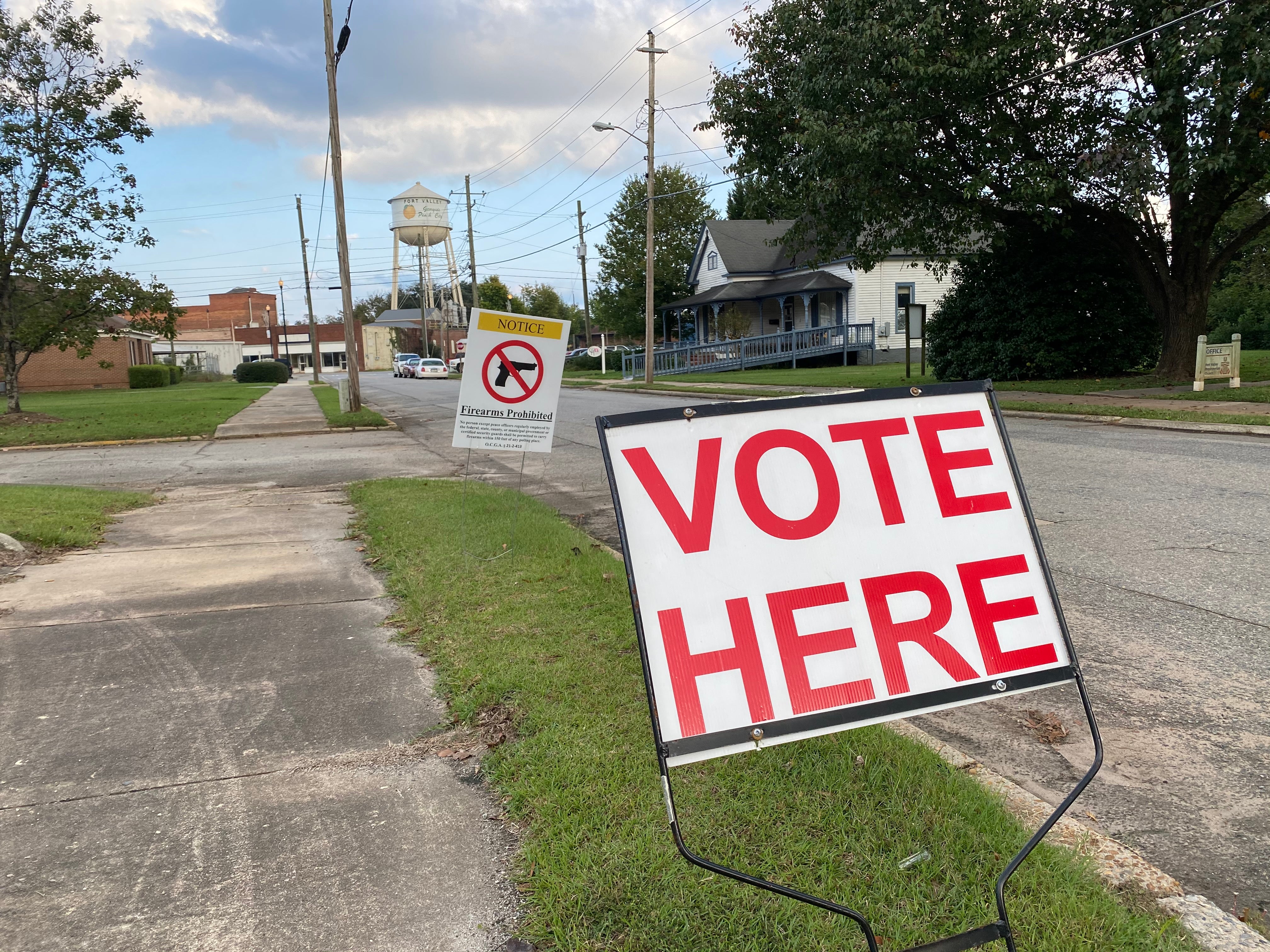A sign outside a polling station in Fort Valley, Georgia, informs visitors that firearms are prohibited inside.