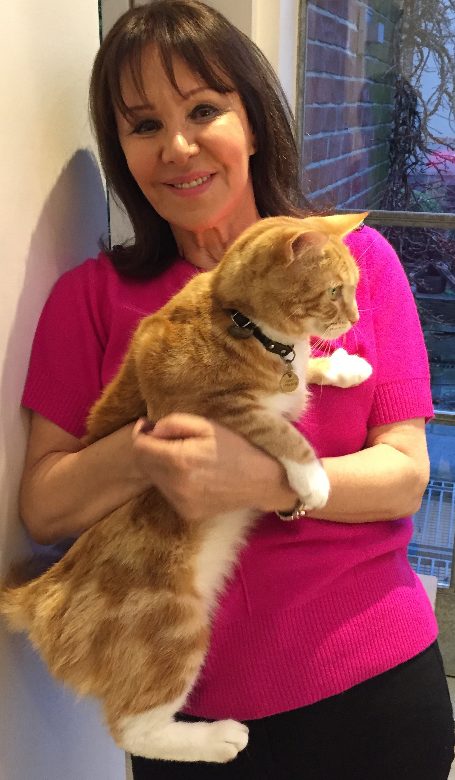 Celebrity judge Arlene Phillips with her own cat Romeo