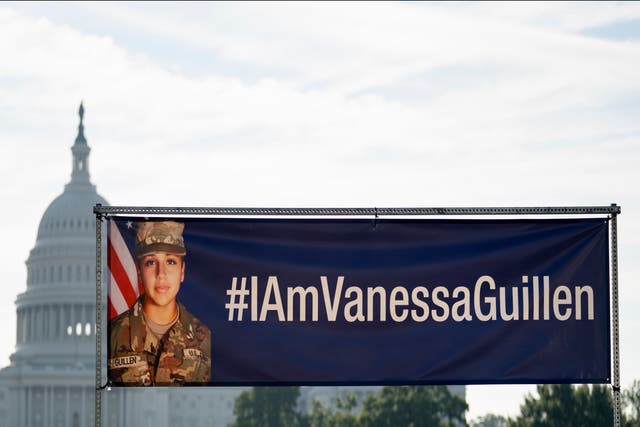 A banner with the image of slain Army Secialist Vanessa Guillen and #IAmVanessaGuillen is displayed before the start of a news conference on the National Mall in Washington, DC on 30 July