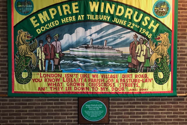 <p>Windrush mural and plaque at the Port of Tilbury</p>