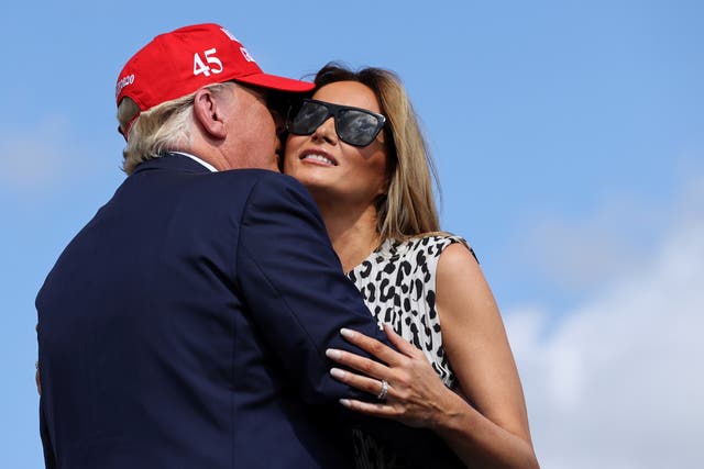 <p>President Donald Trump kisses first lady Melania Trump ahead of a campaign rally outside Raymond James Stadium, in Tampa, Florida. REUTERS/Jonathan Ernst</p>