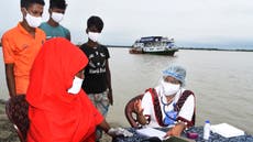 Bangladeshi floating hospital treats flood-ravaged community