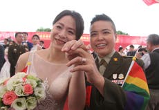 Two same-sex couples in military marry in first for Taiwan